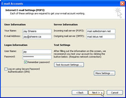 A completed Internet E-mail Settings screen. Mouse cursor is hovering over Next